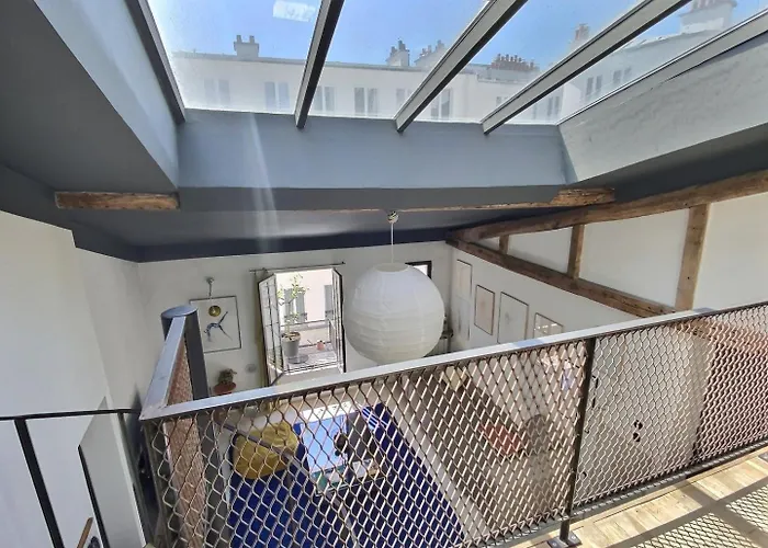 Апартаменты Charming Loft By Canal Saint Martin *